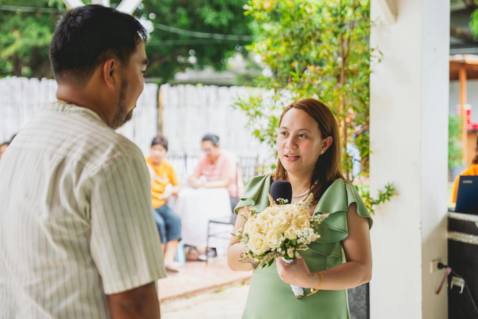 How to Find the Perfect Wedding Band for Him: A Comprehensive Guide Bride Holding a Bouquet of White Roses and Giving a Speech at her Wedding